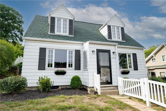 view of new england style home