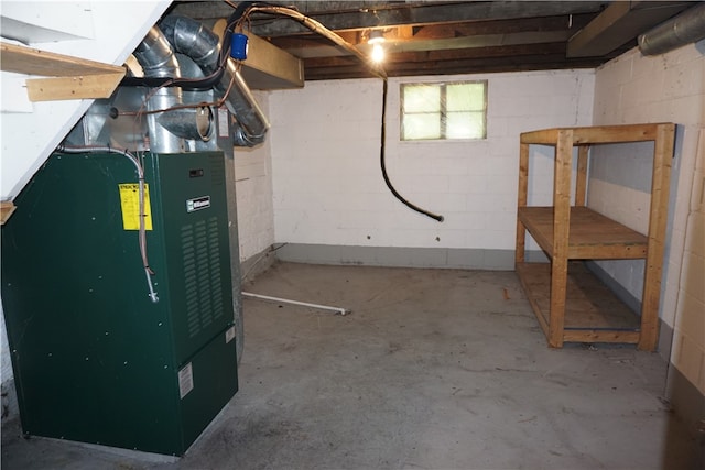 basement featuring heating unit