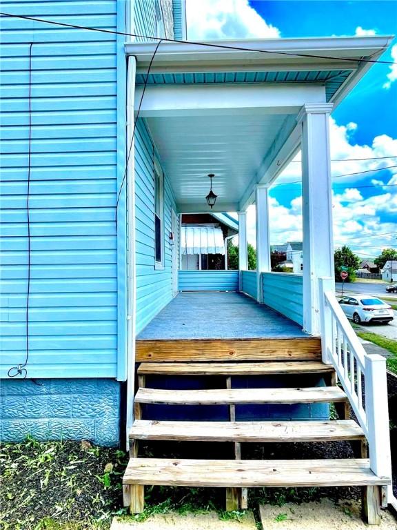 3 N 5th St, Youngwood, PA 15697 - wooden terrace with a porch
