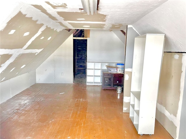 bonus room featuring lofted ceiling