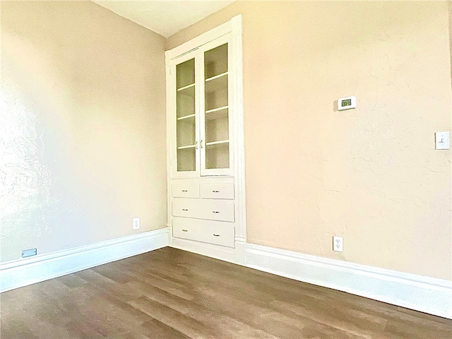 empty room featuring hardwood / wood-style floors