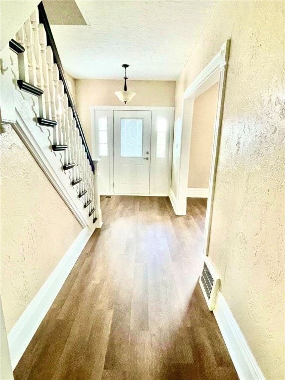 entryway featuring hardwood / wood-style floors