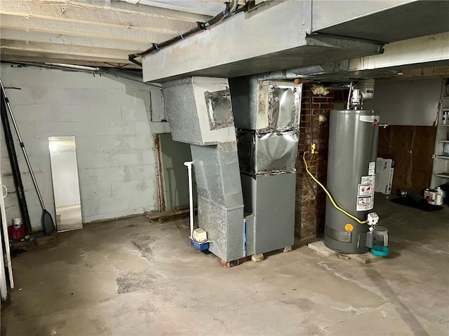 utility room with heating unit and gas water heater