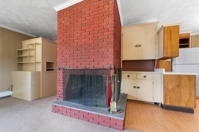 unfurnished living room with a brick fireplace, ornamental molding, and light colored carpet