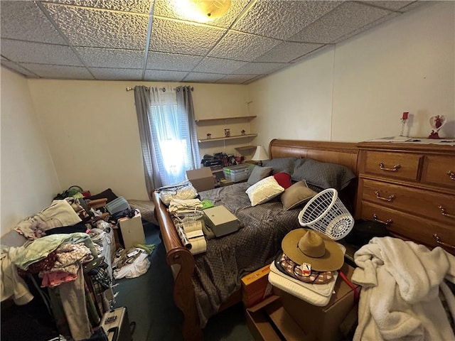 bedroom featuring a drop ceiling