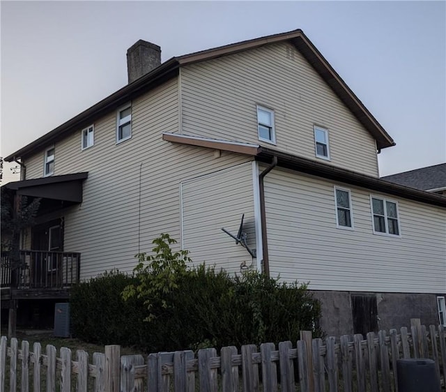 414 Middle Ave, Luzerne Twp, PA 15413 - view of property exterior with a chimney