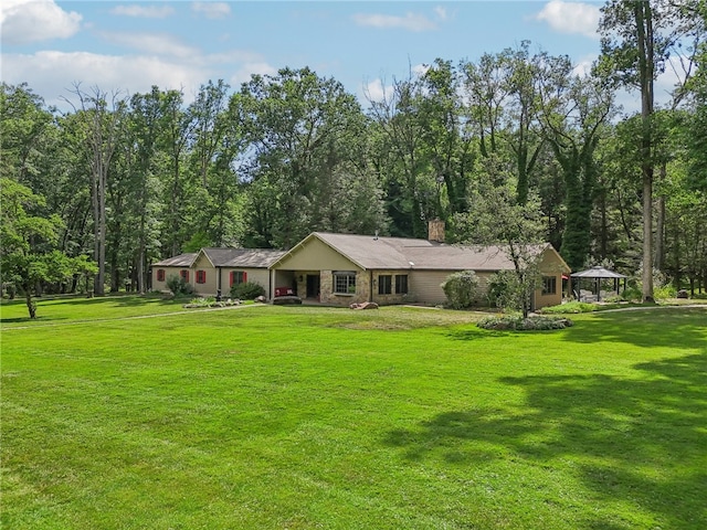 ranch-style house with a front yard