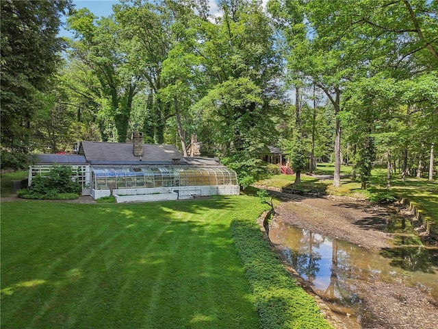 view of yard with a water view