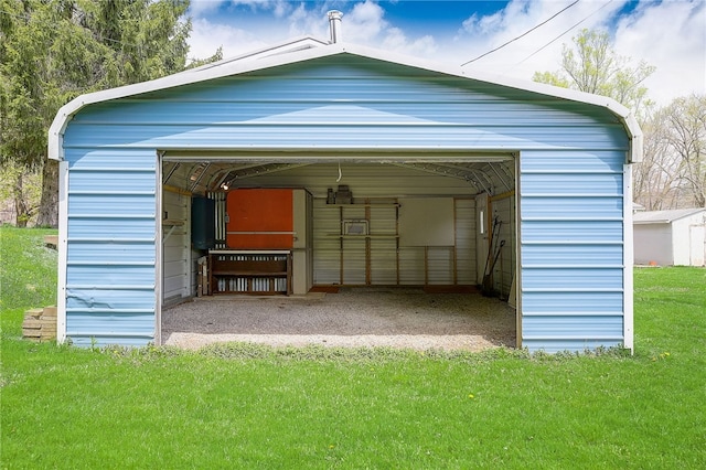 garage with a yard