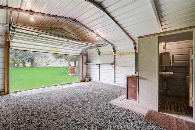 garage with a lawn