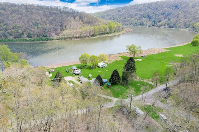 birds eye view of property featuring a water view