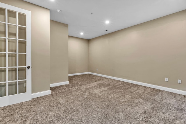 unfurnished room with carpet floors