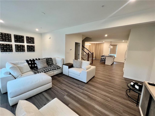 living room with dark hardwood / wood-style floors