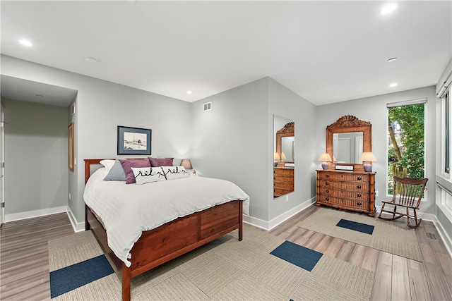 bedroom featuring wood-type flooring