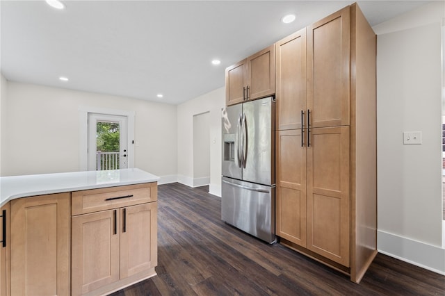 kitchen featuring dark wood-type flooring, light brown cabinetry, and stainless steel refrigerator with ice dispenser