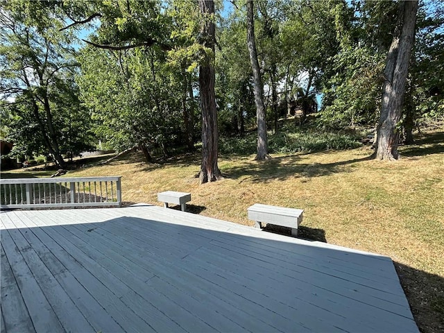 wooden deck with a yard