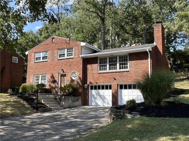 view of front of property with a garage