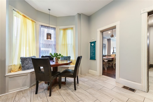 dining space featuring light hardwood / wood-style flooring