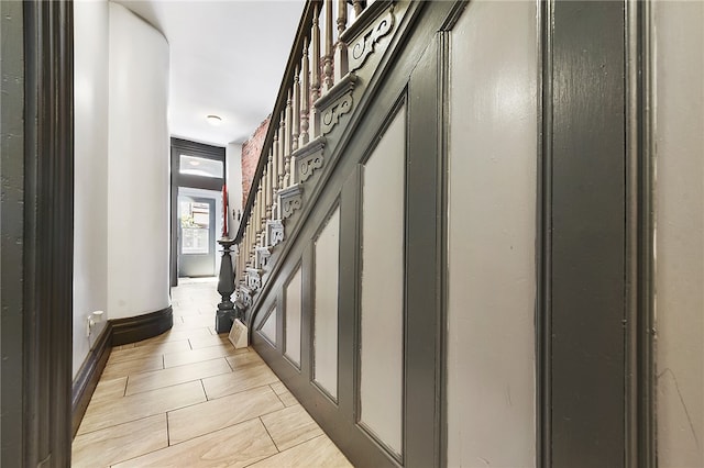 hallway featuring light tile patterned floors