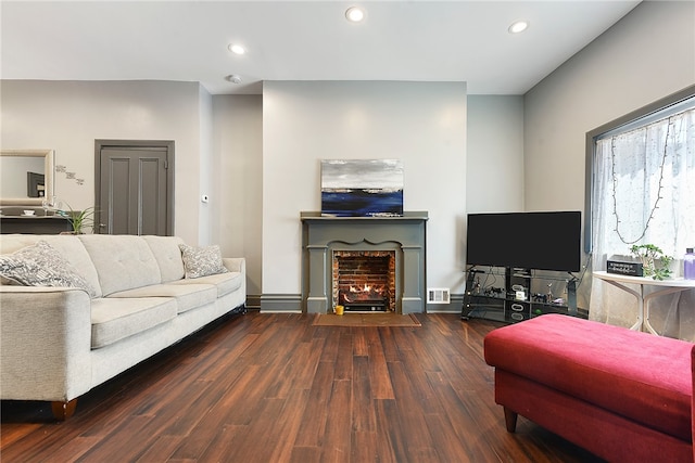 living room with dark hardwood / wood-style floors