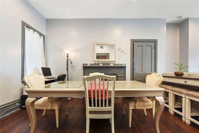 dining room with hardwood / wood-style floors