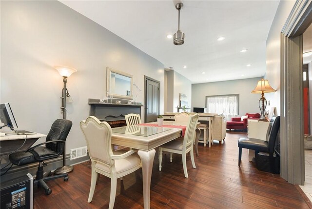 dining room featuring hardwood / wood-style flooring