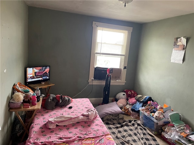 bedroom featuring cooling unit