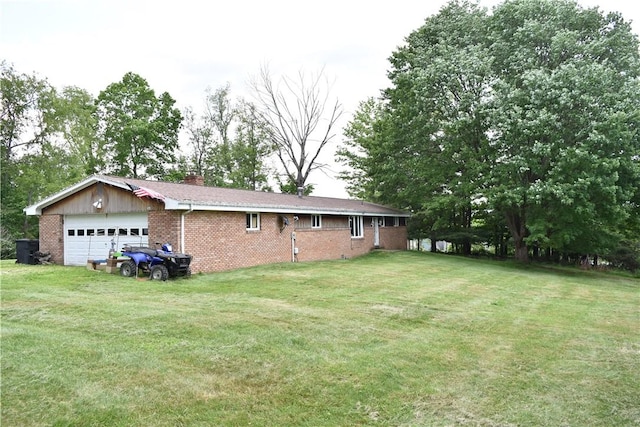 view of yard featuring a garage