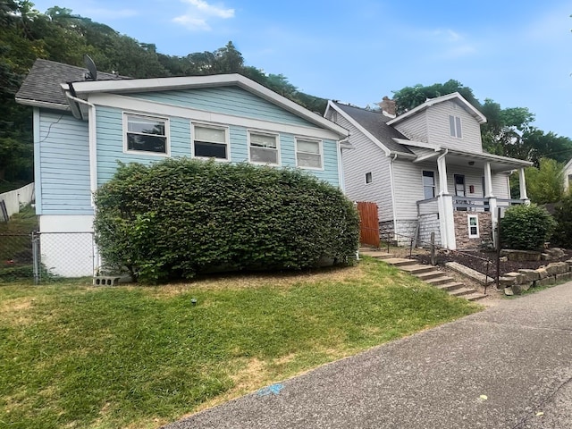 bungalow with a front yard