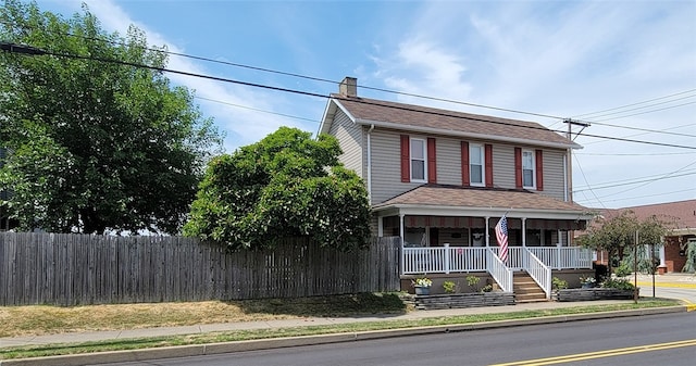 view of front of property featuring covered porch