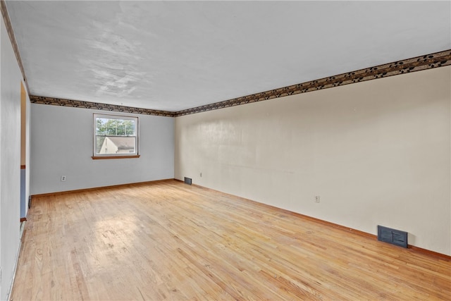 empty room featuring light hardwood / wood-style floors