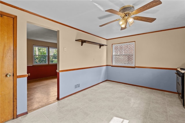 unfurnished room with light tile patterned flooring, crown molding, and ceiling fan