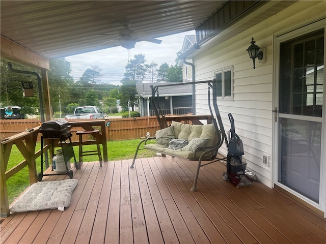 wooden deck with ceiling fan