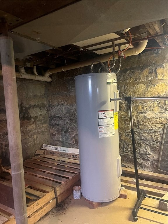 utility room featuring electric water heater