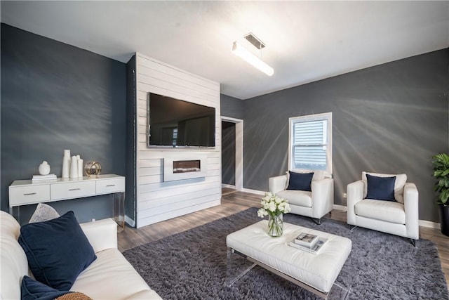 living room featuring dark wood-type flooring