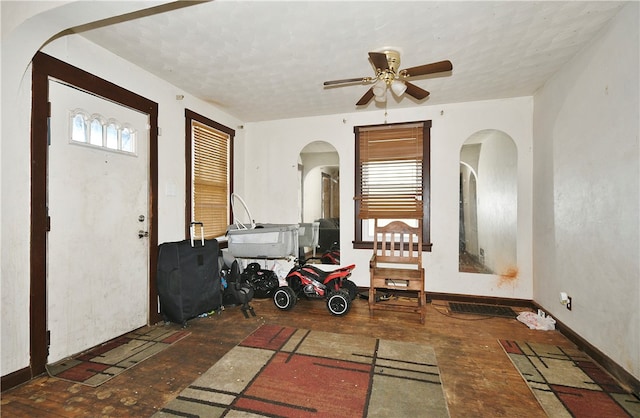 misc room with ceiling fan