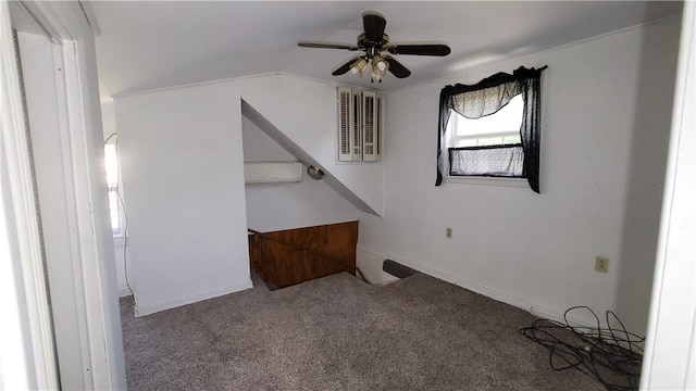 interior space featuring ceiling fan and an AC wall unit