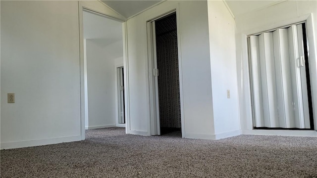 unfurnished bedroom with carpet flooring