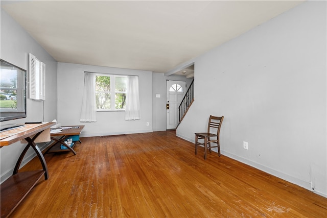 interior space featuring hardwood / wood-style flooring and plenty of natural light