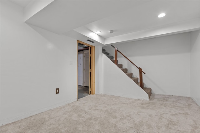 basement featuring carpet flooring