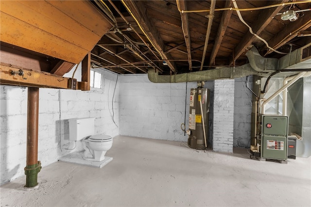 basement featuring water heater and heating unit