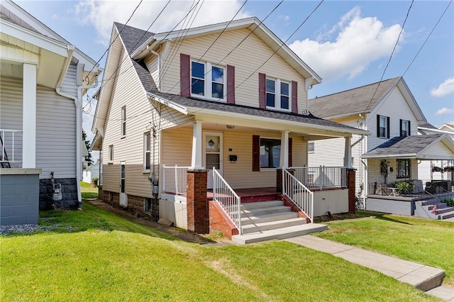 view of front of home with a porch and a front lawn