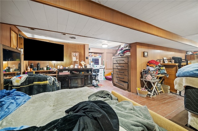 living room with wood walls