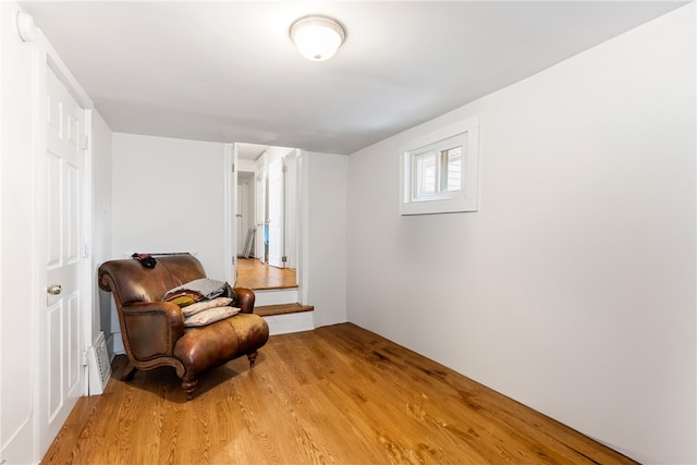 sitting room with light wood-type flooring