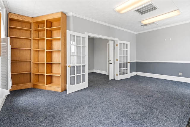 carpeted empty room featuring radiator heating unit, crown molding, and french doors