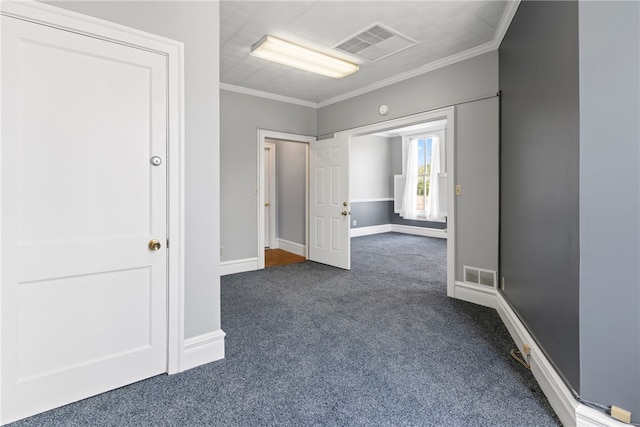 corridor with carpet floors and crown molding