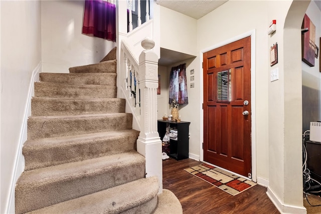 foyer featuring dark hardwood / wood-style floors