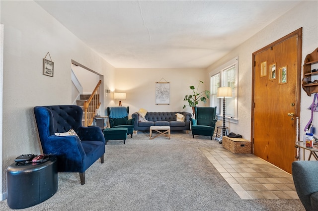 living room featuring light carpet