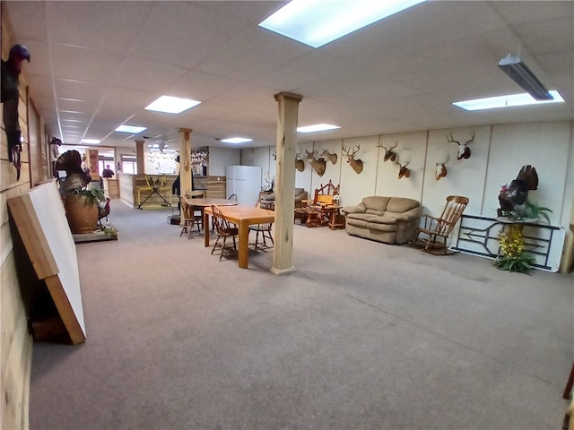 interior space featuring carpet flooring and white refrigerator