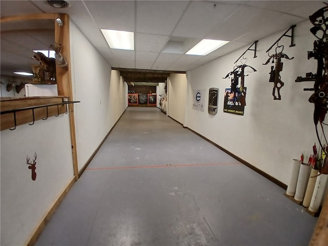 interior space featuring a paneled ceiling